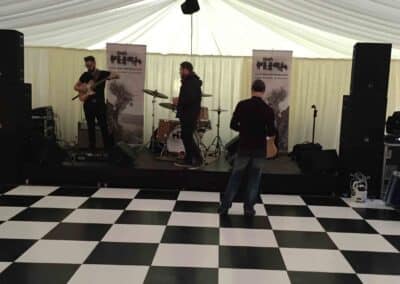 Marquees.Com | Temporary warehouse and long term marquee hire Cheshire and North West | Dance floor and band