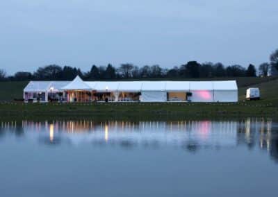 Marquees.Com | Pagoda and Sky Lounge Marquee Hire Cheshire and North West | Clearspan marquee side view at dusk