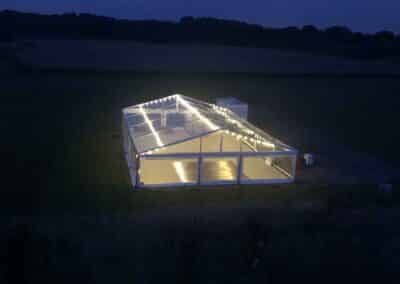 Marquees.Com | Pagoda and Sky Lounge Marquee Hire Cheshire and North West | Illuminated clearspan marquee birds eye view