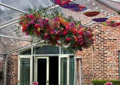 Marquees.Com | Pagoda and Sky Lounge Marquee Hire Cheshire and North West | flowe installation in courtyard marquee