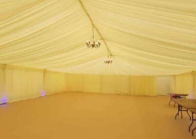 Marquees.Com | Temporary warehouse and long term marquee hire Cheshire and North West | Empty marquee showing ivory pleated linings