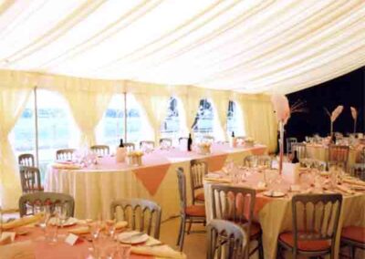 Marquees.Com | Temporary warehouse and long term marquee hire Cheshire and North West | Oval top table