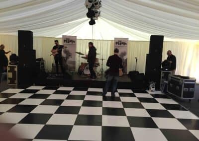 Marquees.Com | Temporary warehouse and long term marquee hire Cheshire and North West | Band setting up