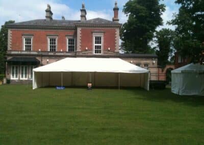 Marquees.Com | Temporary warehouse and long term marquee hire Cheshire and North West | Modular frame marquee in fron tof house