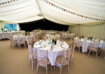 Marquees.Com | Temporary warehouse and long term marquee hire Cheshire and North West | Round wedding tables