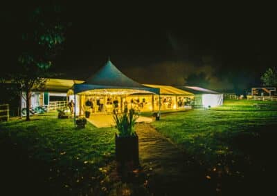 Marquees.Com | Temporary warehouse and long term marquee hire Cheshire and North West | Wedding marquee at night