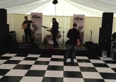 Marquees.Com | Modular and Clearspan Marquee Hire Cheshire and North West | Band setting up
