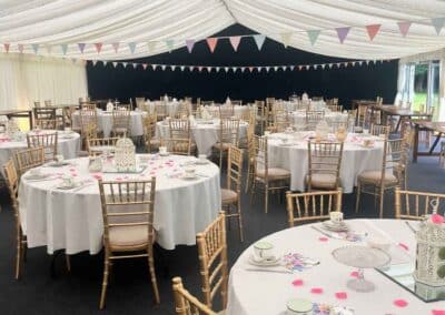 Marquees.Com | Modular and Clearspan Marquee Hire Cheshire and North West | Round tables and gold chairs